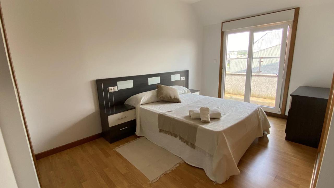A Cuarta Ronda Apartment Melide Bagian luar foto