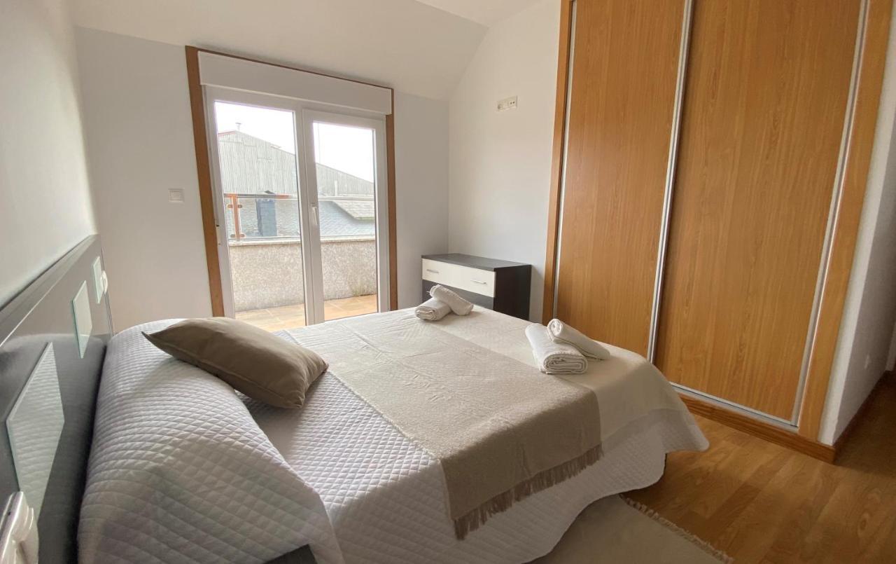 A Cuarta Ronda Apartment Melide Bagian luar foto